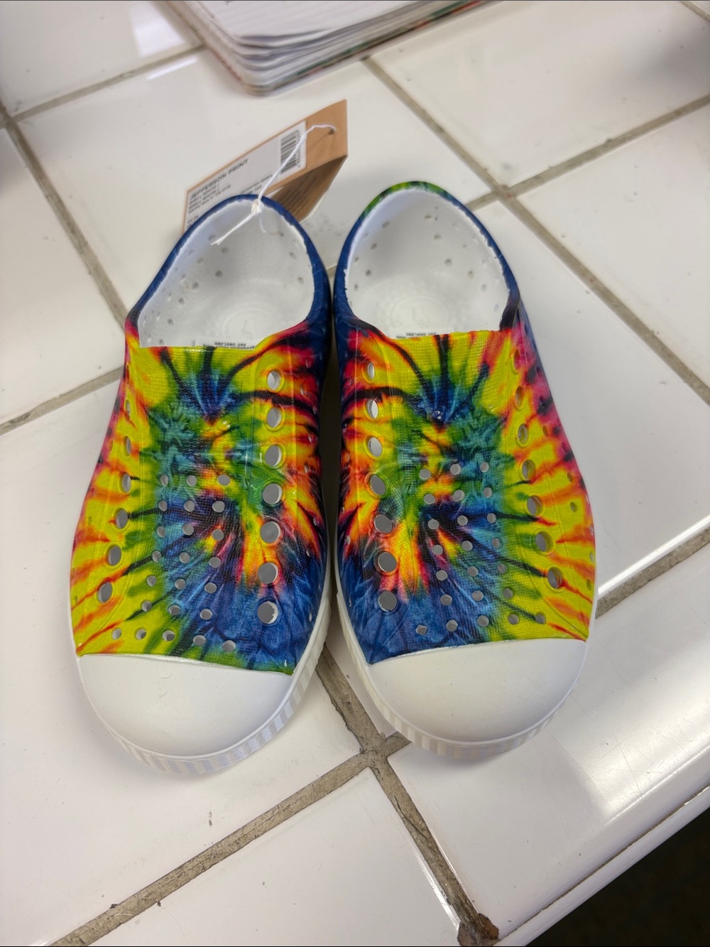 Native Shoes Kids Tie-Dye Water-Ready Slip-Ons in Yellow Blue Green Red